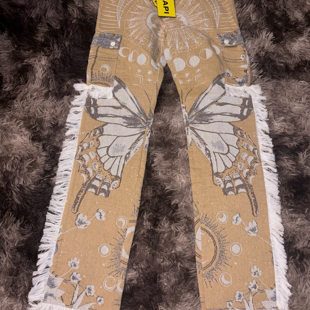 Guapi Butterfly Print Distressed jeans